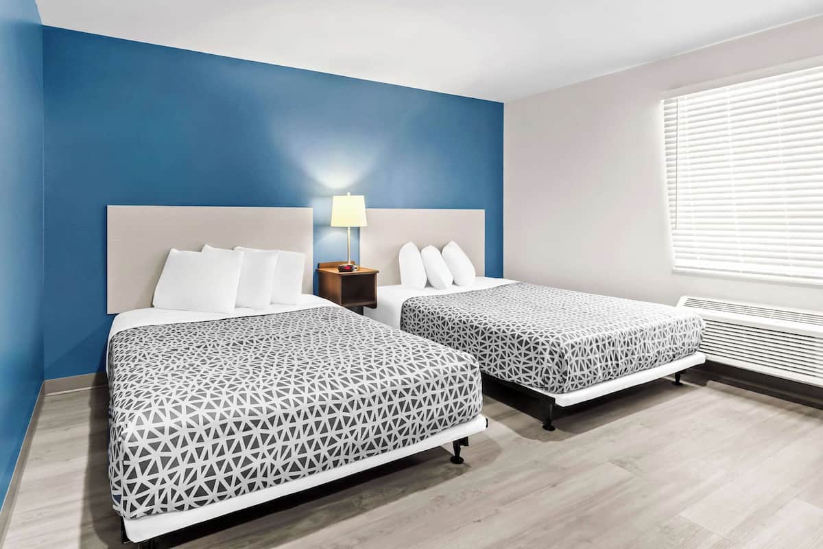 Suite, 2 Queen Beds, Accessible, Non Smoking | Individually furnished, desk, laptop workspace, bed sheets