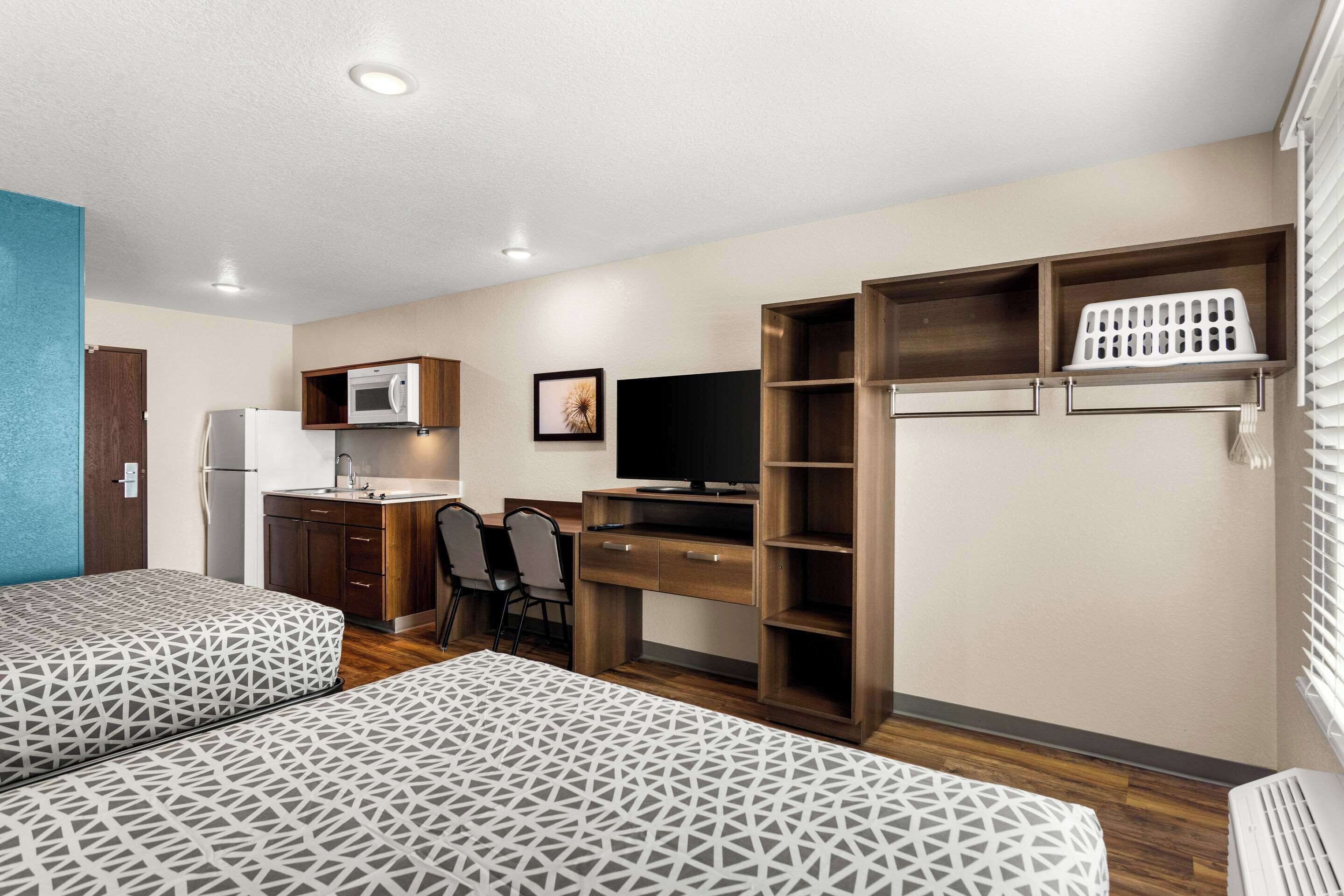 Individually furnished, desk, laptop workspace, bed sheets