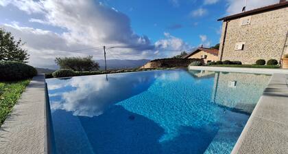 Restored Farmhouse With Infinity Pool, Mountain Views and Landscaped Garden