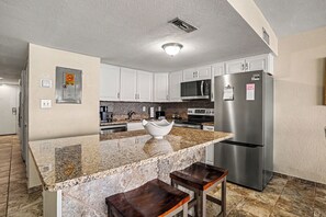 Fridge, microwave, oven, stovetop - Oceanfront 2bed/2bath-Water's Edge Resort-1011 Indoor/Outdoor Pool & Hot Tub (Garden City Beach)