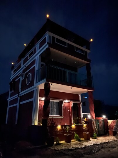 Beautifully designed Earthern home situated at the base of Skandagiri hills. 