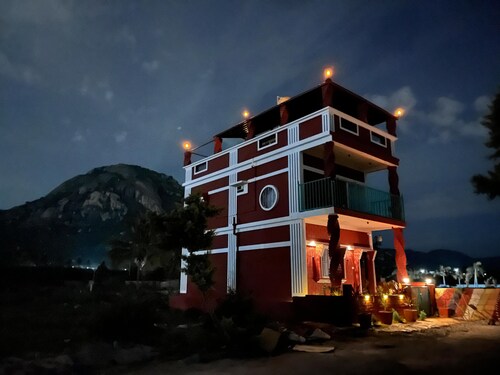 Beautifully designed Earthern home situated at the base of Skandagiri hills. 