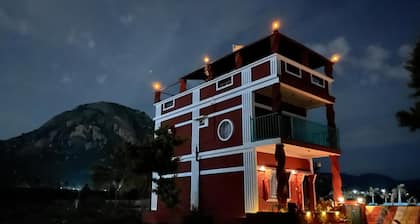 Beautifully designed Earthern home situated at the base of Skandagiri hills.