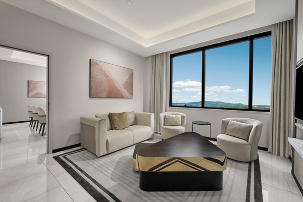 Suite, 1 King Bed | Living area | 55-inch Smart TV with satellite channels