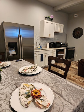 Luxury Room | Private kitchen | Coffee/tea maker, dining tables