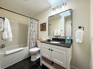 Hair dryer, towels, soap, shampoo