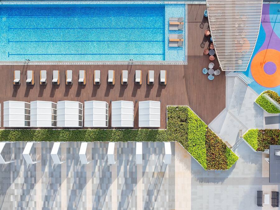 Seasonal outdoor pool, pool umbrellas, pool loungers