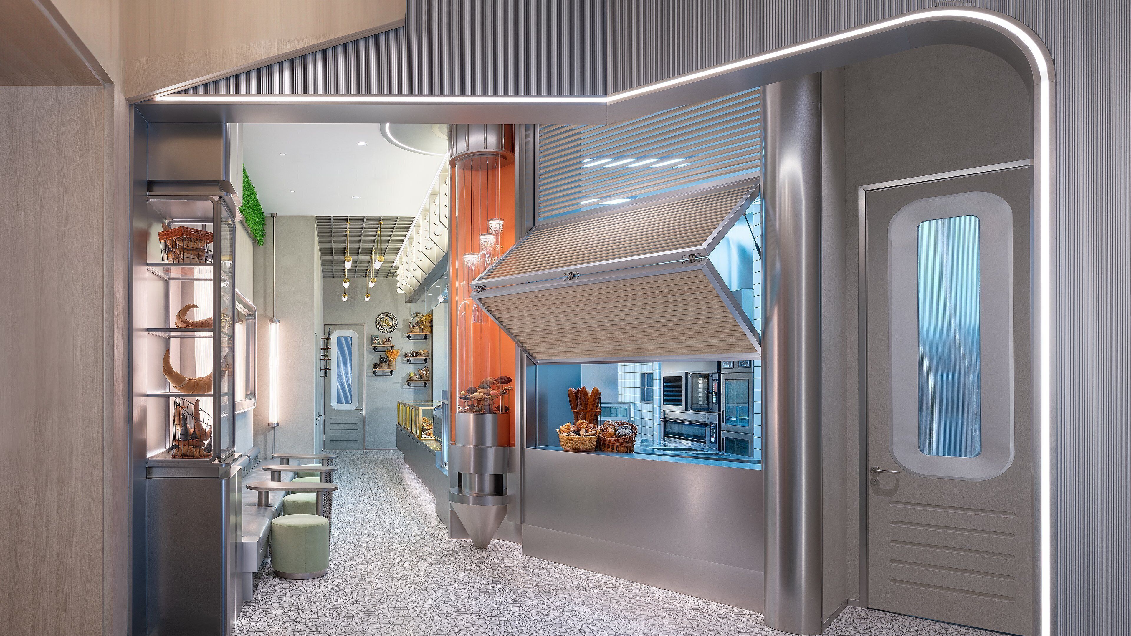 A modern kitchen with stainless steel appliances, a built-in oven, and a large window overlooking the city.