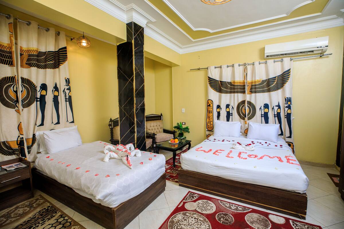 Family Room | Premium bedding, down comforters, pillowtop beds, in-room safe