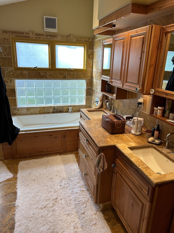 Shower, hair dryer, towels, toilet paper