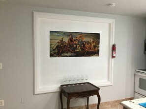 Enjoy a sophisticated atmosphere with a historic painting and elegant wine service.