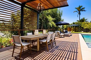 Outdoor dining - Spacious Remodeled Home With a Pool and Luxe Amenities! (Santa Barbara)