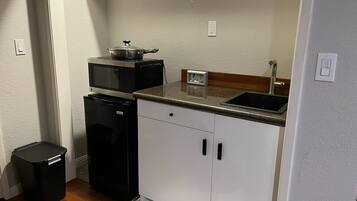 Fridge, microwave, coffee/tea maker, electric kettle