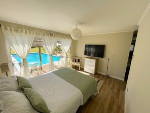 4 habitaciones, tabla de planchar con plancha, wifi y ropa de cama 