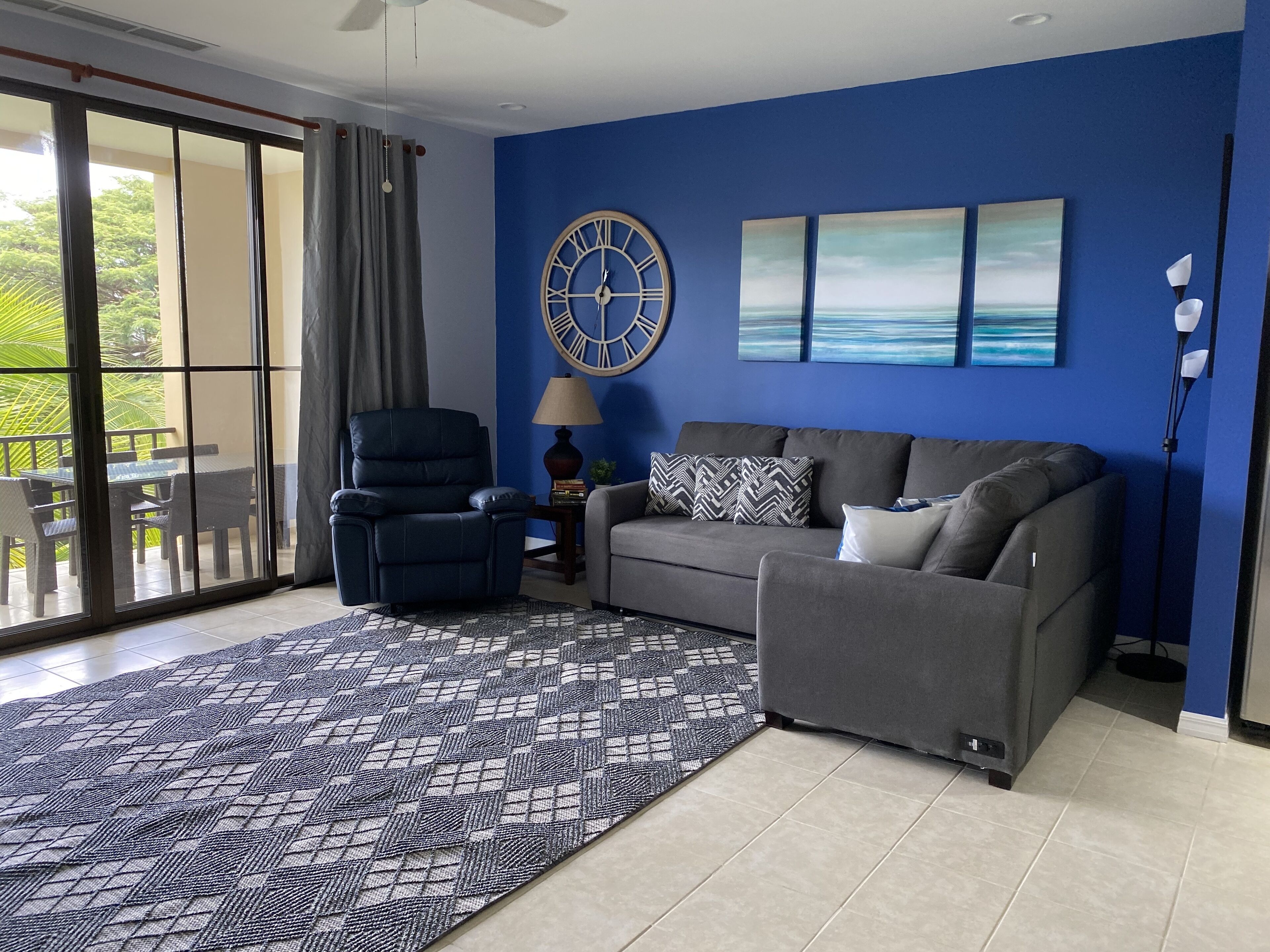 Lovely living room that steps out onto the spacious terrace overlooking the pool