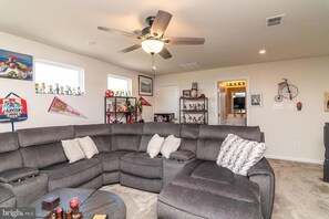 Living area - One bedroom on upper floor w/full bath & living room available for one person.   (Millsboro)