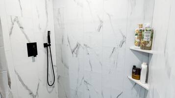 Hair dryer, towels, soap, shampoo