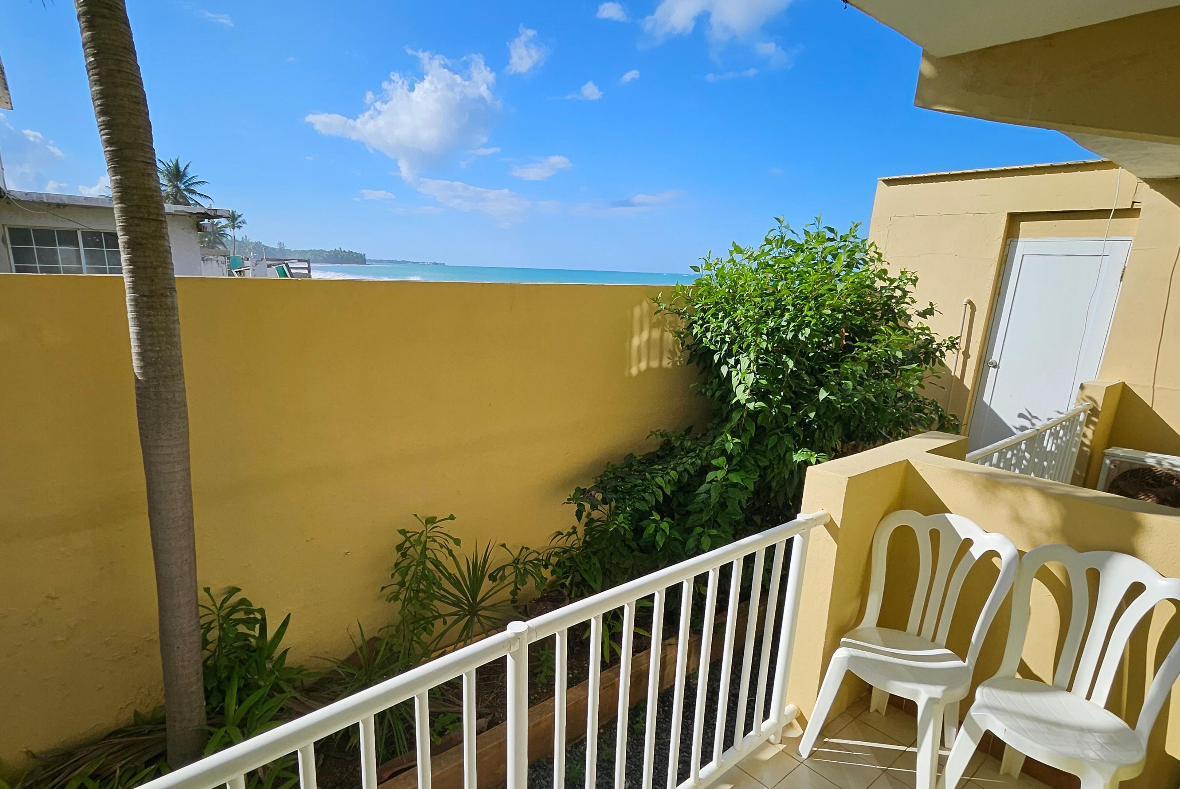 Deluxe Double Room, 2 Double Beds, Balcony, Garden View | Beach/ocean view