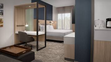 Een moderne hotelkamer met een bed, een bureau, een stoel, een kleine bank, een spiegel, een koffieapparaat en een televisie.