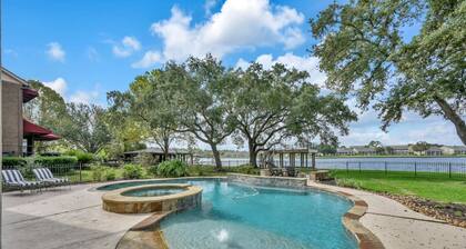 Lux Waterfront Home | 2 Primary Suites, 4 BR, Boat Dock & Views | Heated Pool & Spa