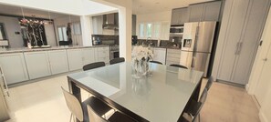 Fridge, microwave, oven, stovetop - Luxury 5BR/4BA Villa • Pool • Steps to Design District • Shopping & Dinning! (Miami)