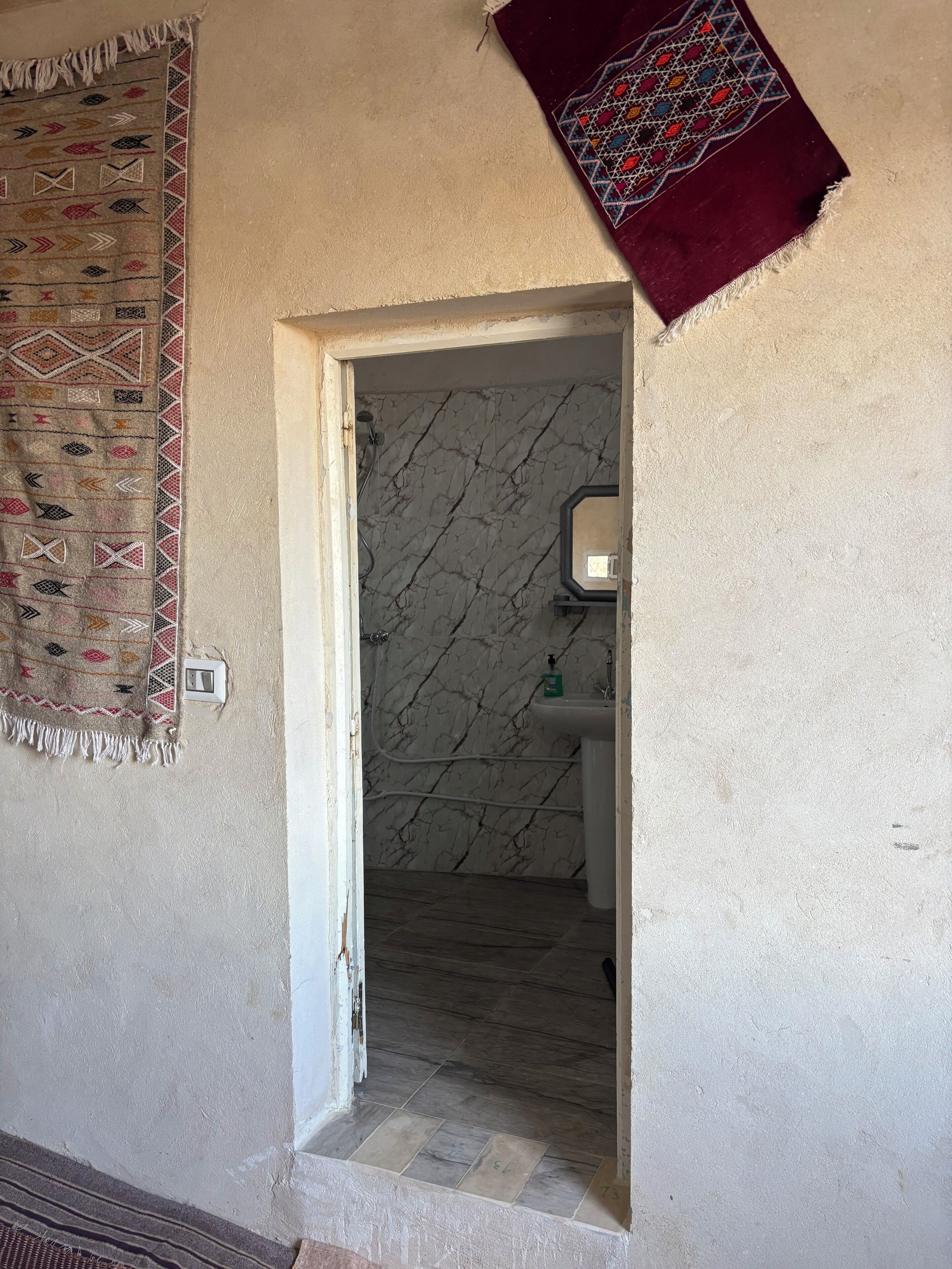 Panorama-suite | Badeværelse | Bruser, brusehoved med spredningseffekt, badekåber, håndklæder