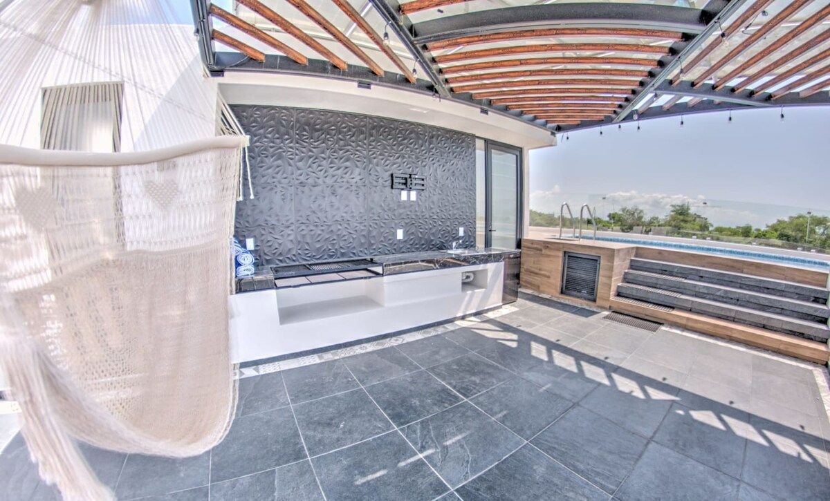 Private rooftop pool with grill