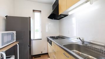 Standard Chalet | Private kitchen | Fridge, microwave, stovetop, rice cooker