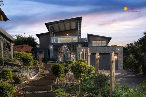 Tri level house with 5 bdrms, game room, balcony with valley view & deck.