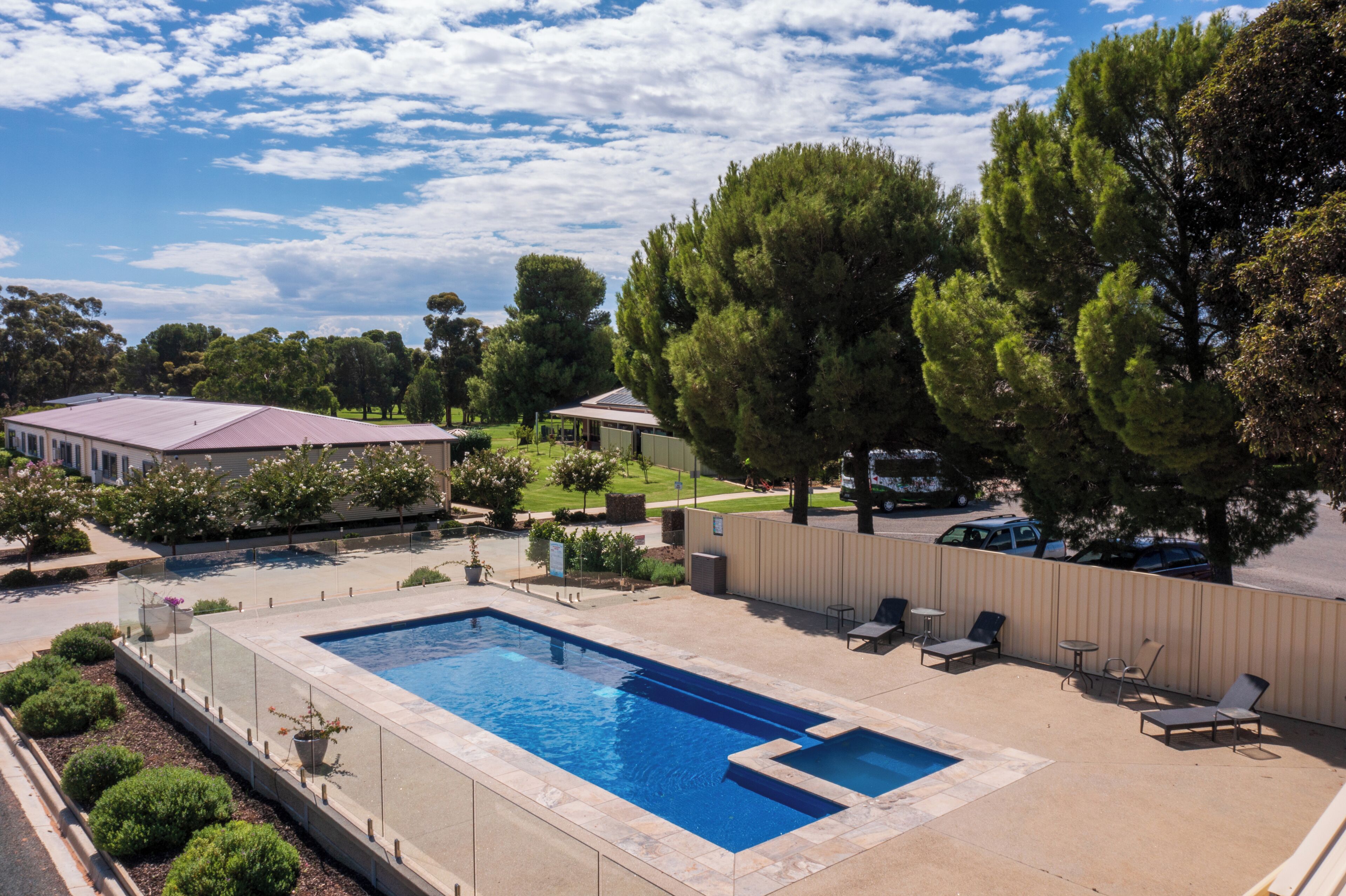 Outdoor pool, open 8:00 AM to 7:00 PM, pool umbrellas, pool loungers