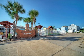 Property grounds - Shared Resort-Style Pool, Playground, Patio w/ Bar | Tidal Times by AvantStay (Port Aransas)