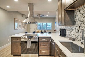 Fridge, microwave, oven, stovetop - Port A Escape w/ Pools, Patio, Walk to Beach| La Concha by AvantStay (Port Aransas)