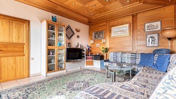 Family House, 3 Bedrooms, Microwave, Mountainside (Pool Chalet Adonis w/ Panoramic Views) | Living area | Flat-screen TV, stereo