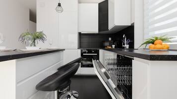 Apartment, 2 Bedrooms, 2 Bathrooms | Private kitchen | Microwave, oven, dishwasher, cookware/dishes/utensils