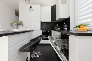 Apartment, 2 Bedrooms, 2 Bathrooms | Private kitchen | Microwave, oven, dishwasher, cookware/dishes/utensils - Szlachecka Apartment, Parking by Renters (Warsaw)