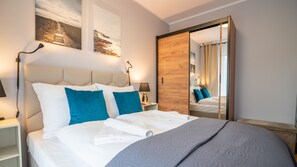 Tabla de planchar con plancha, wifi gratis y ropa de cama 