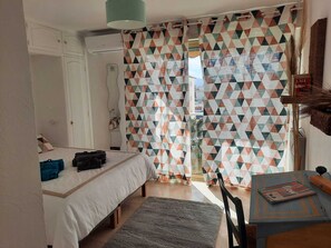 1 bedroom, desk, iron/ironing board, travel cot