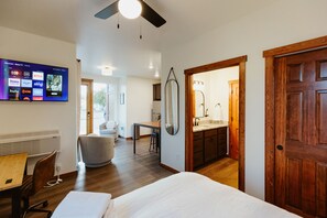 1 bedroom, desk, iron/ironing board, travel crib