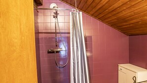 A shower with a curtain, a wooden ceiling, and purple tiled walls. - 3-room apartment for 7 ppl, Châtel, pets allowed (Châtel)