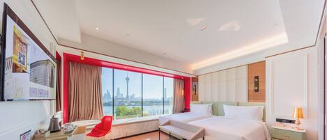 Gold (Resorts World) Fireworks Sea View Room | Down comforters, in-room safe, blackout drapes, iron/ironing board