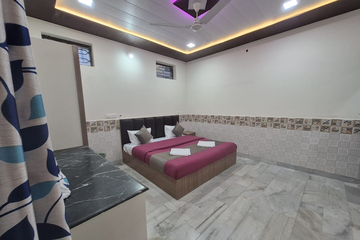 Habitación doble estándar | Edredón, cortinas blackout y insonorización