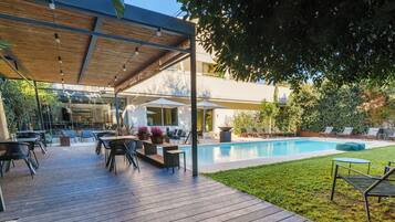 Outdoor pool, pool umbrellas, pool loungers