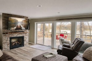 TV, fireplace - Lakefront Haven • Dock, Fishing, Swim (Cadiz)