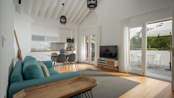 Vila conforto | Área de estar | Smart TV 55 polegadas com canais a cabo