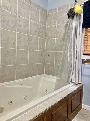 Jetted tub, towels, soap, toilet paper