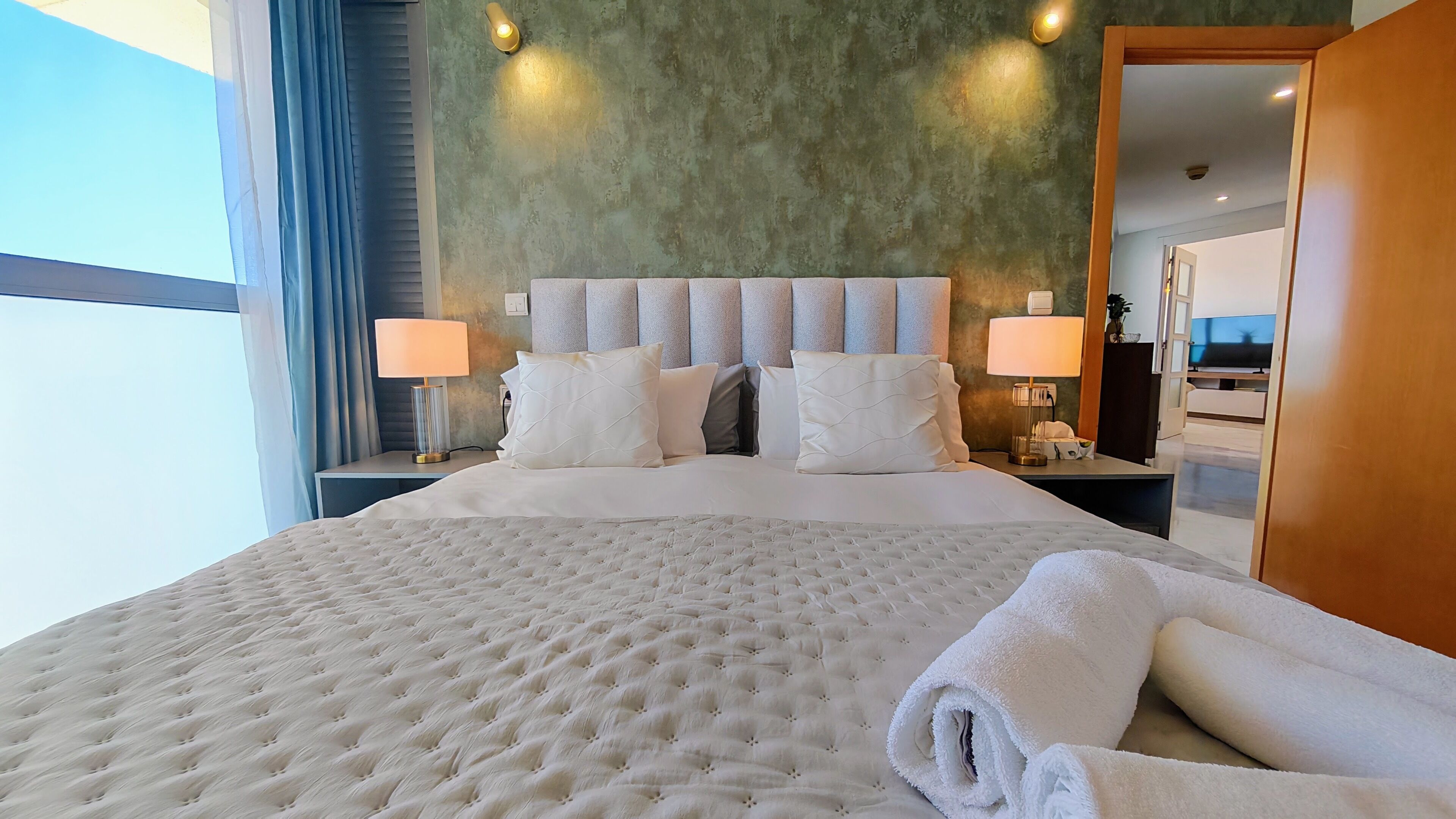 Premium bedding, blackout drapes, soundproofing, iron/ironing board