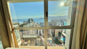 Superior Apartment, Sea View | Living area | 55-inch flat-screen TV with digital channels