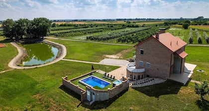 Secluded villa with pool and jacuzzi surrounded with orchards
