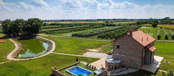 Secluded villa with pool and jacuzzi surrounded with orchards