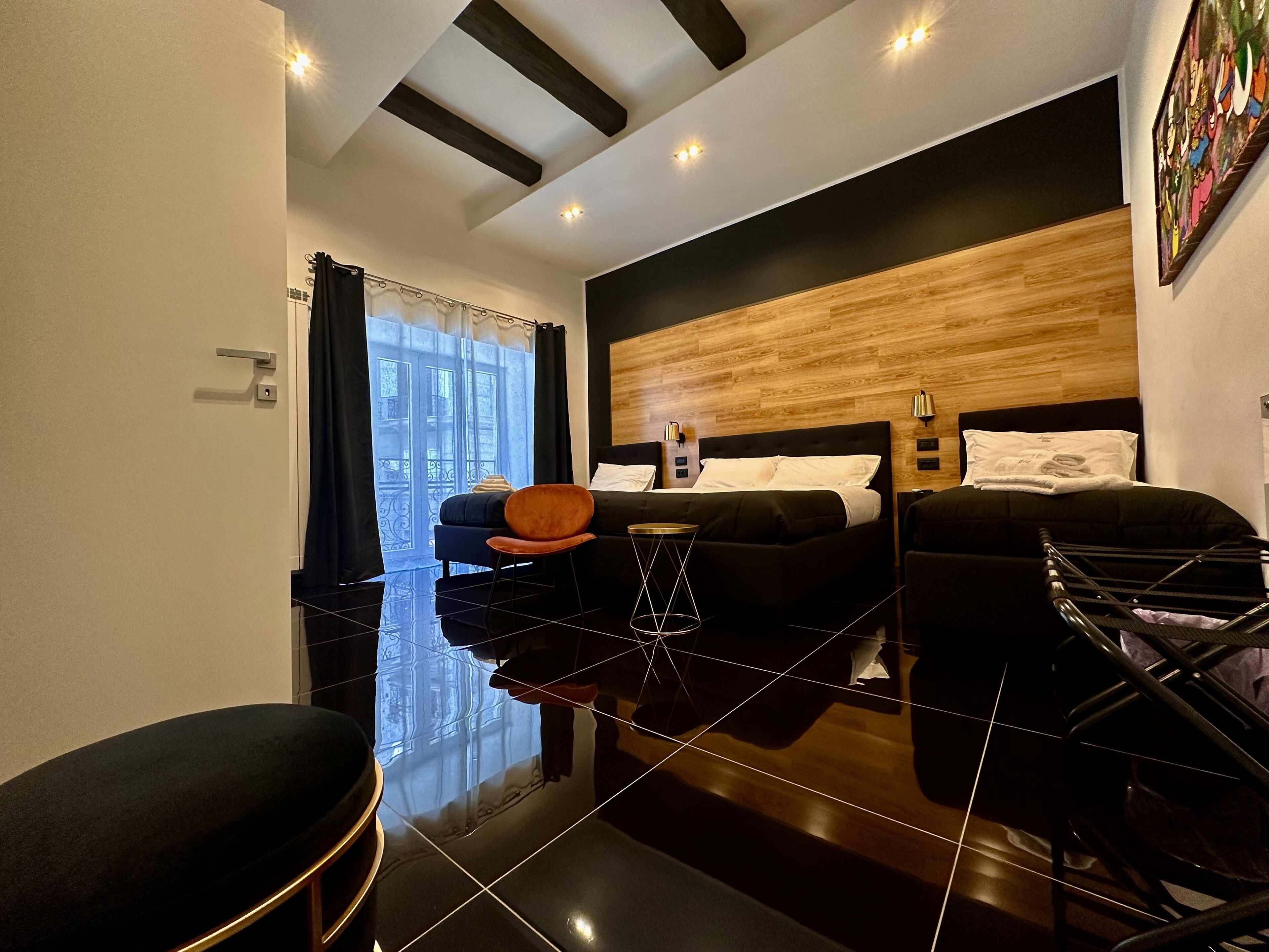 Deluxe Quadruple Room | In-room safe, desk, blackout curtains, soundproofing